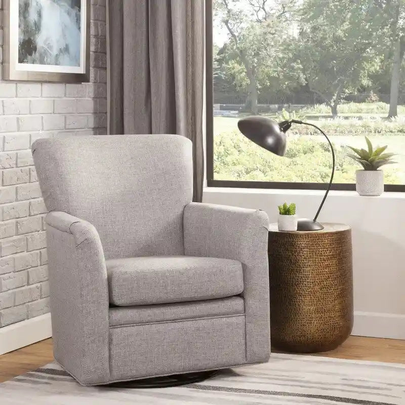 Fauteuil berçant pivotant à 360° avec base ronde en métal et assise rembourrée