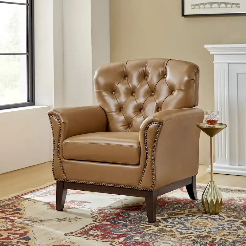 Fauteuil d'appoint en cuir véritable capitonné à dossier haut avec clous décoratifs et pieds en bois
