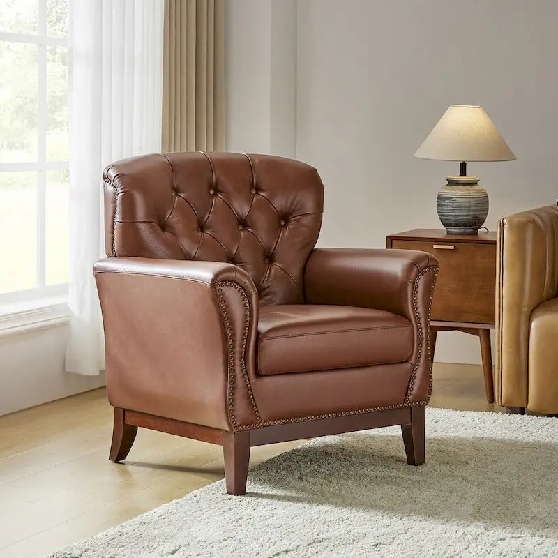 Fauteuil d'appoint en cuir véritable capitonné à dossier haut avec clous décoratifs et pieds en bois