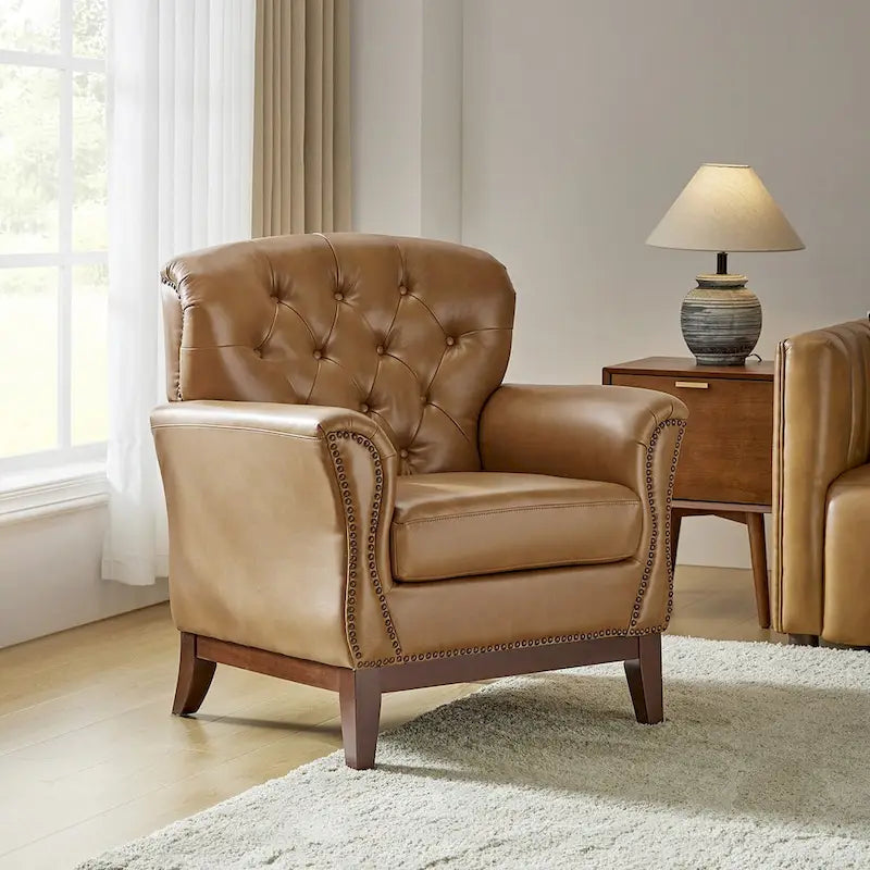 Fauteuil d'appoint en cuir véritable capitonné à dossier haut avec clous décoratifs et pieds en bois