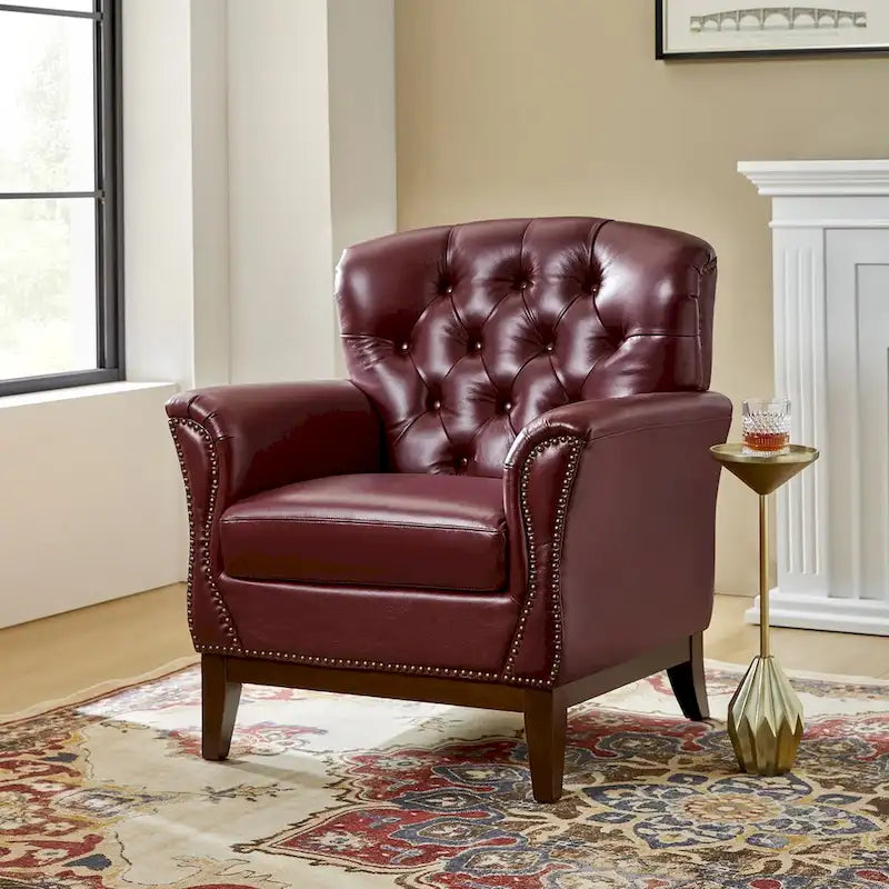 Fauteuil d'appoint en cuir véritable capitonné à dossier haut avec clous décoratifs et pieds en bois