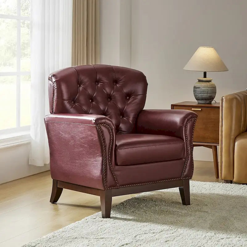 Fauteuil d'appoint en cuir véritable capitonné à dossier haut avec clous décoratifs et pieds en bois