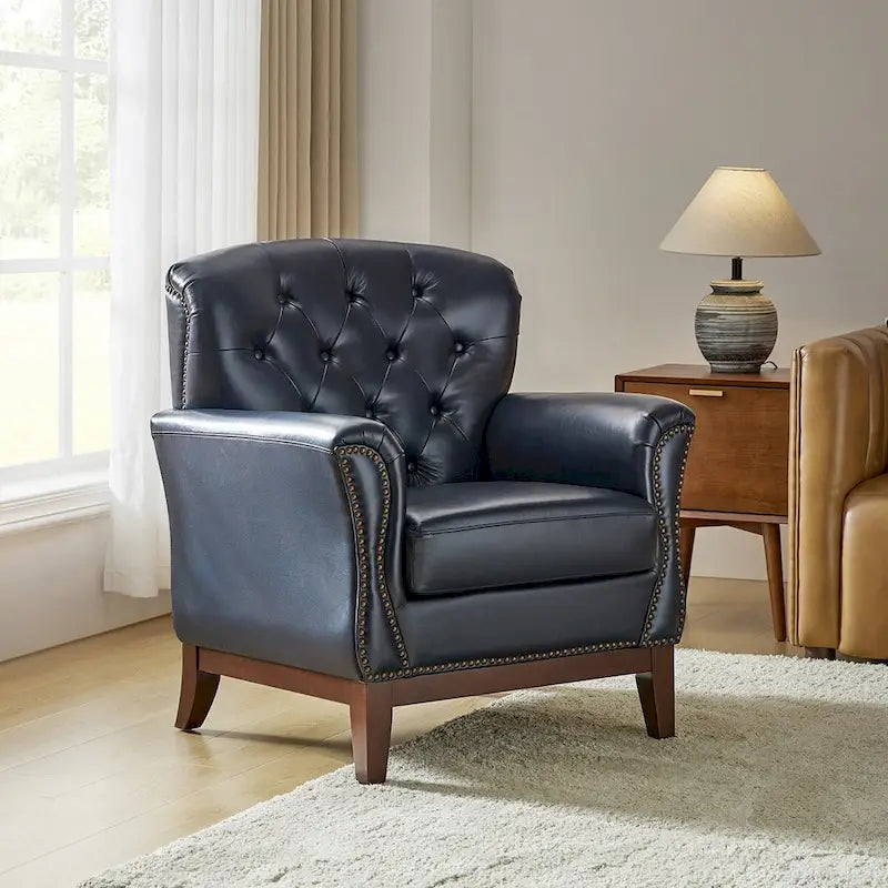 Fauteuil d'appoint en cuir véritable capitonné à dossier haut avec clous décoratifs et pieds en bois